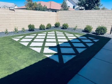 Residential backyard lawn with artificial turf
